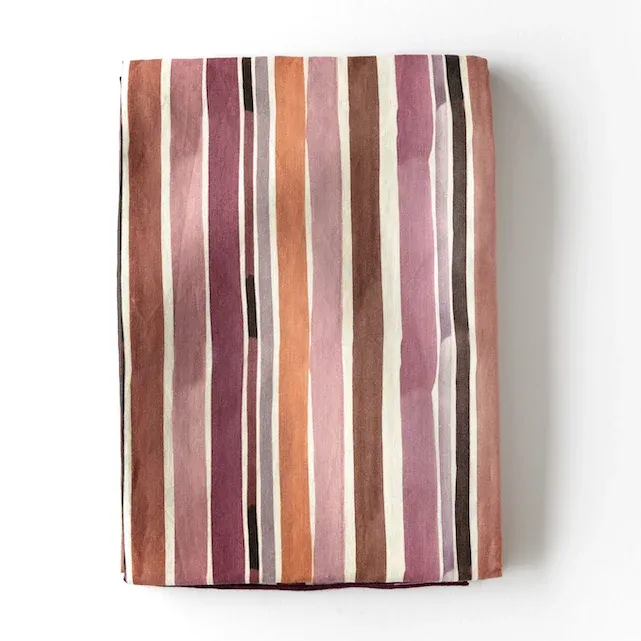 Lisbon Stripe linen tablecloth styled on round dining table - Goldie Home